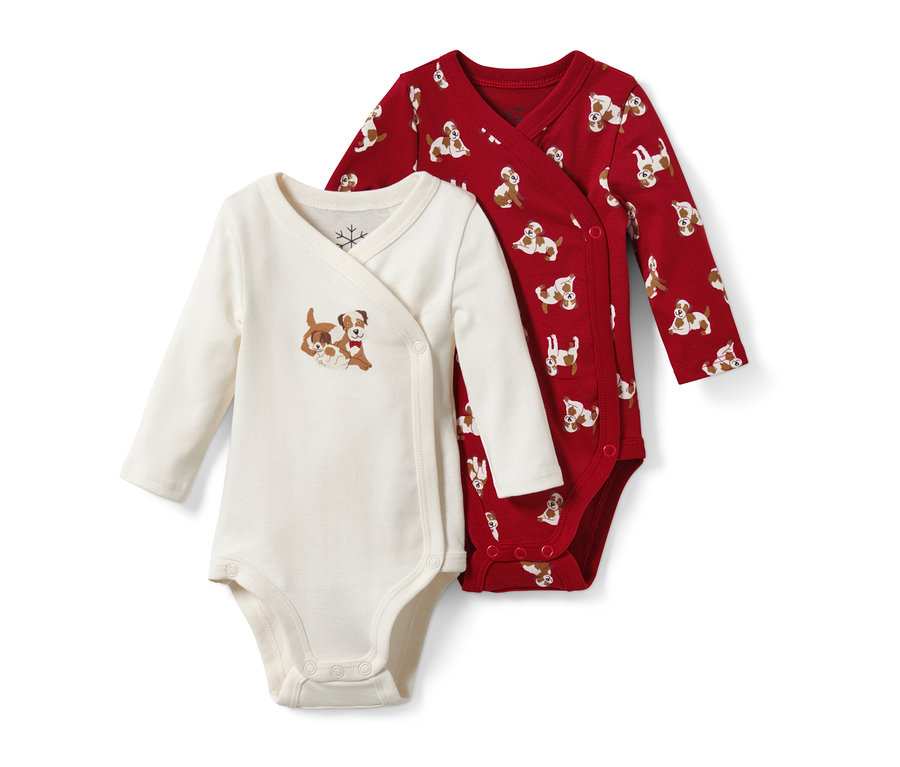 Két kisgyerek body: egy krémszínű, kutyás mintával, a másik piros, kutyás nyomattal.