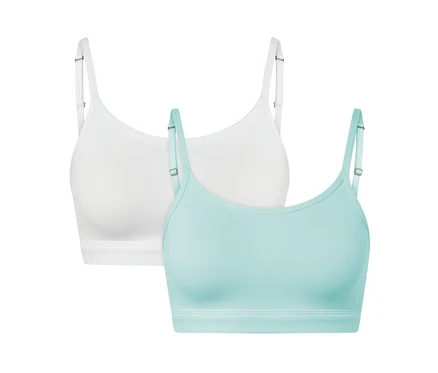 Két bustier melltartó, egy fehér és egy világoskék.