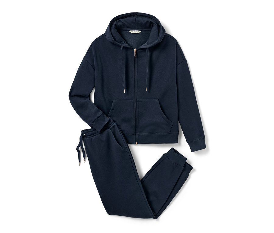 Sötétkék, cipzáras, kapucnis női szabadidő szett hozzáillő tréningalsóval.