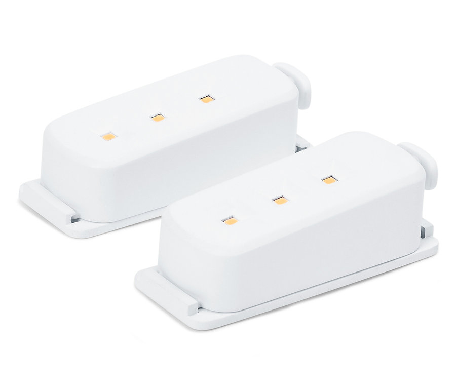 Két fehér elektronikus modul LED-ekkel fehér háttéren.