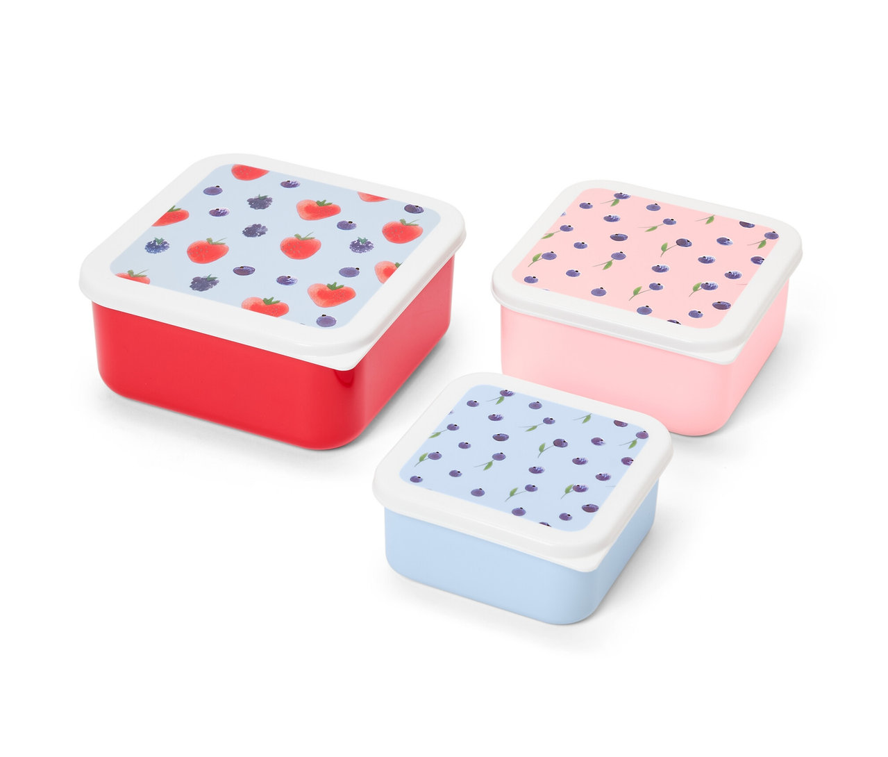 Három különböző méretű uzsonnásdoboz piros, rózsaszín és kék színben, gyümölcsmintával.