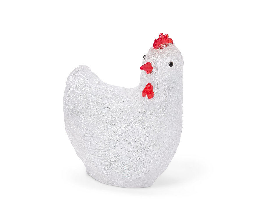 Egy fehér, piros tarajú napelemes LED-es tyúk kültéri használatra, közelről fényképezve.