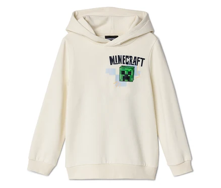 Egy krémszínű kapucnis pulóver Minecraft logóval és egy zöld Creeper arccal a mellkasán.