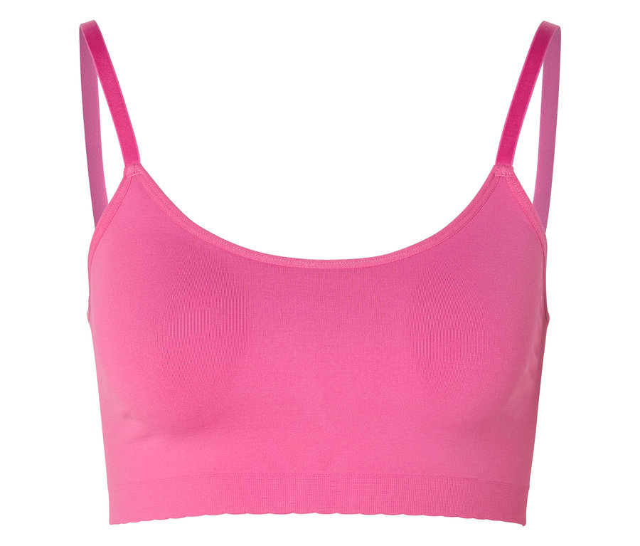 Rózsaszín, seamless bustier melltartó csipkével és vékony pántokkal, fehér háttér előtt.