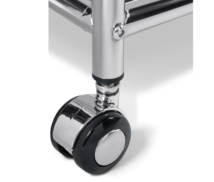 A szürke, fiókos »CN3« fém kisasztal részlete, a görgőre fókuszálva.