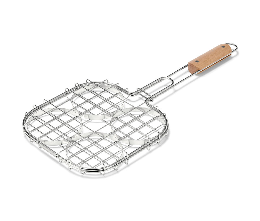 Grillező hamburgerforgató négy kerek mélyedéssel és fa nyéllel.