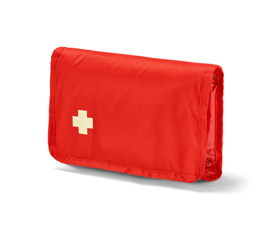 Piros elsősegélynyújtó táska fehér kereszttel.