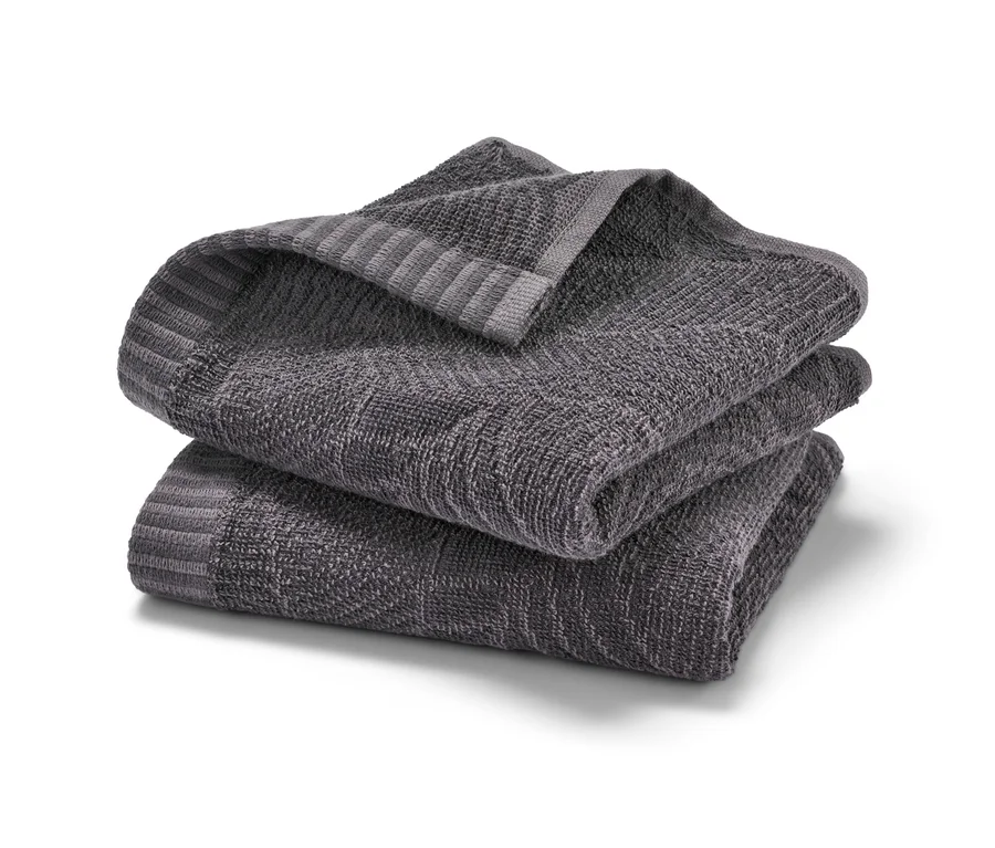 Egymásra helyezett 2 Jacquard vendégtörölköző.