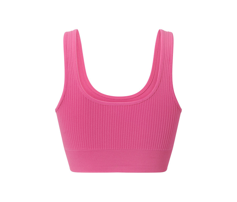 Közelkép egy női bustier sportmelltartóról, rózsaszínben.