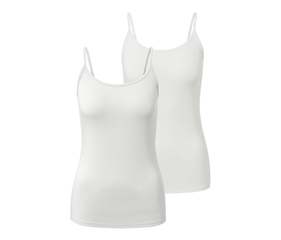 Két fehér, vékony pántos női trikó.