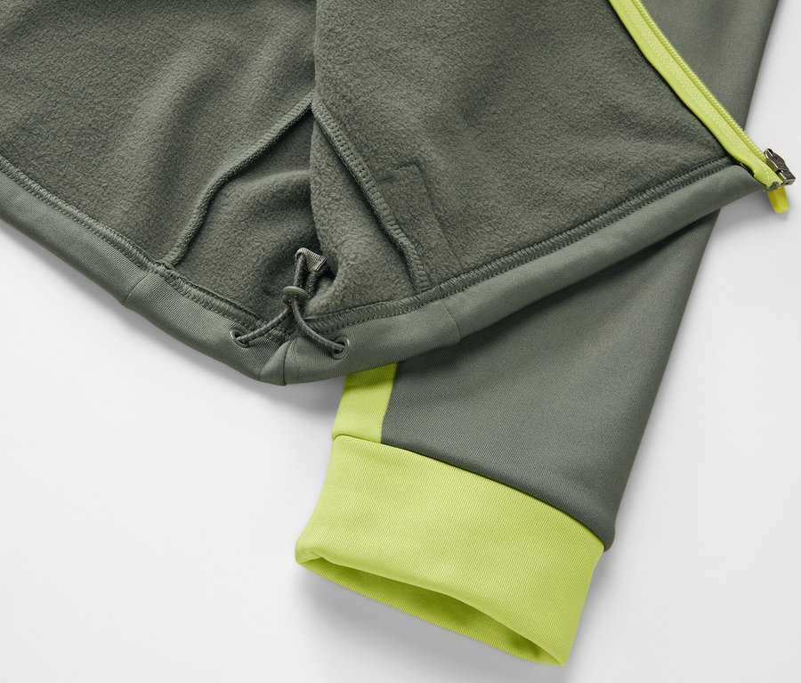 A khaki/lime férfi termofelső részlete.