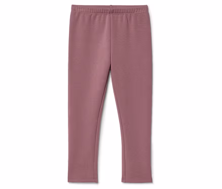 Lila színű leggings gumis derékpánttal fekszik fehér háttéren.