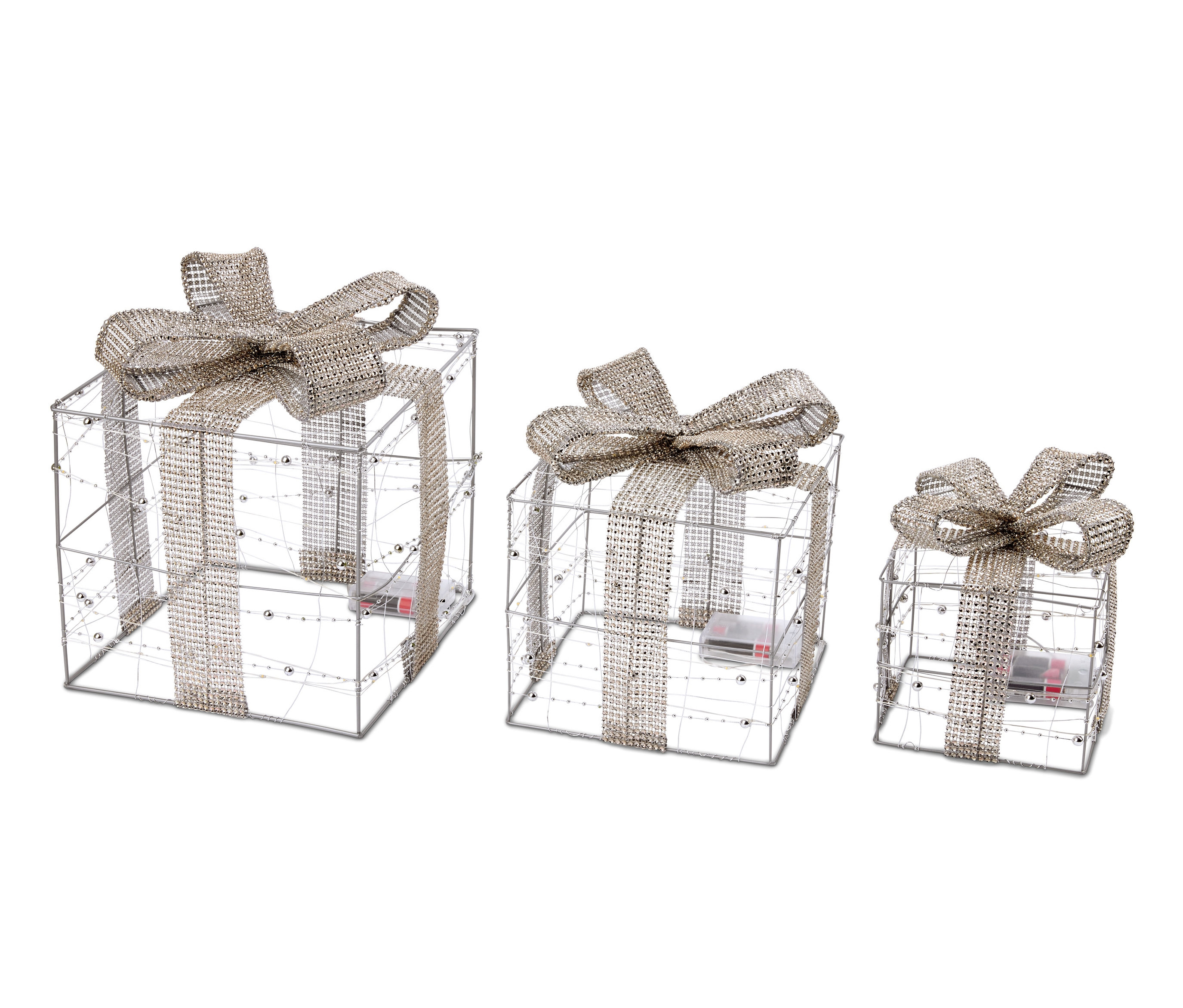 Három LED-es ajándékdoboz masnival, fehér háttérrel.