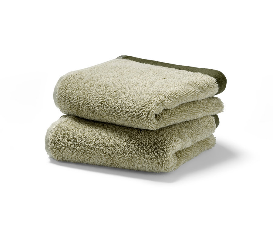 Két jacquard vendégtörölköző egymáson.