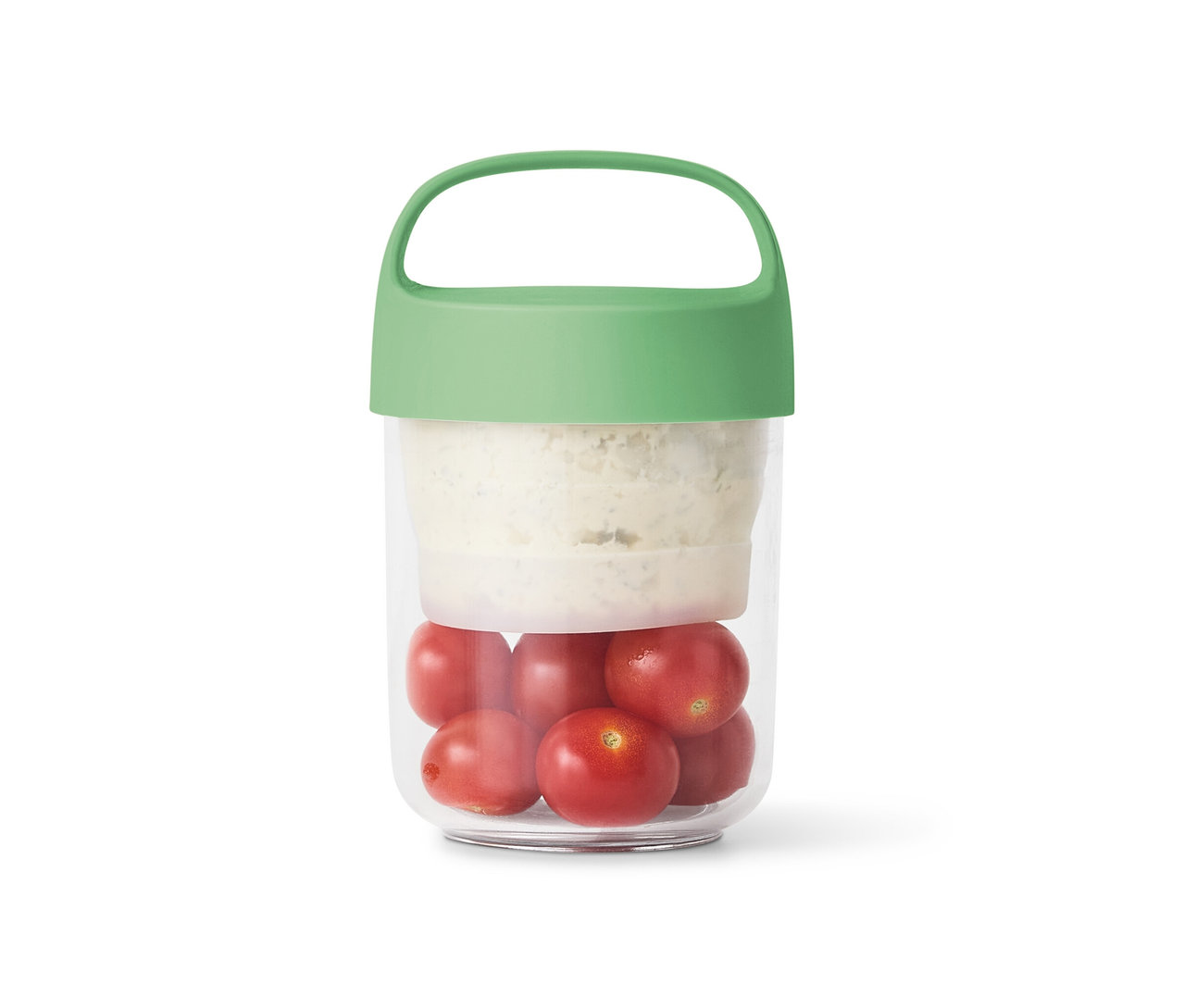 Kicsi To-Go ételhordó doboz paradicsommal és mártogatóssal.