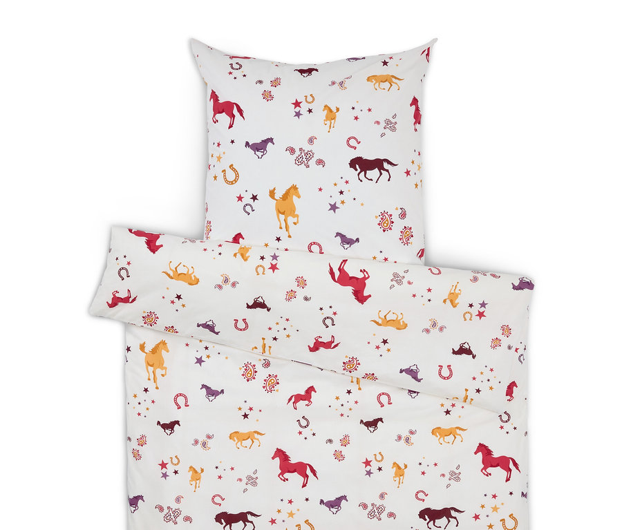 Fehér ágynemű ló, csillag és patkó mintával.