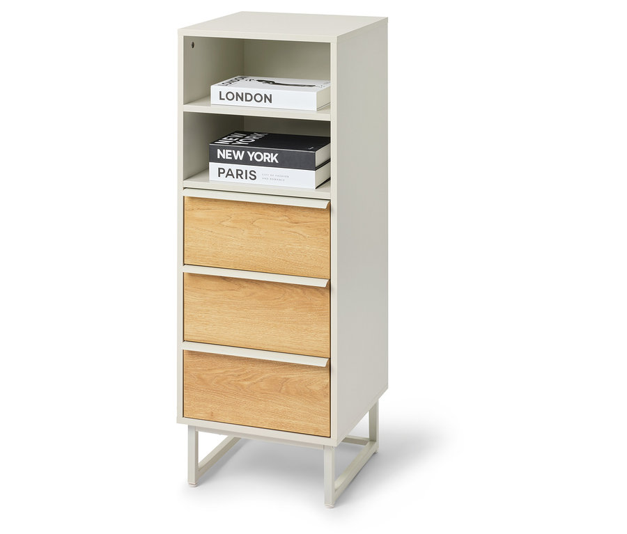 A »LEEG« fiókos magas szekrény 3 fiókkal fehér háttér előtt.