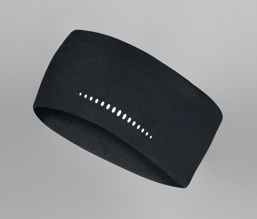 Fekete sport fejpánt fényvisszaverő elemekkel, szürke háttérrel.