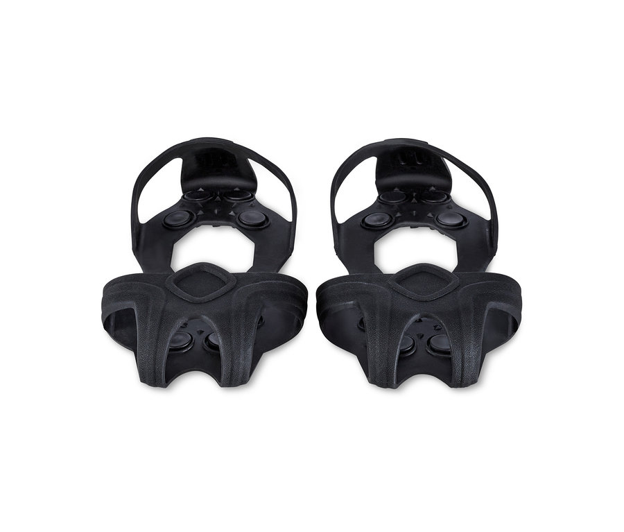 Két fekete Csúszásgátló cipőtalp fehér háttérrel.