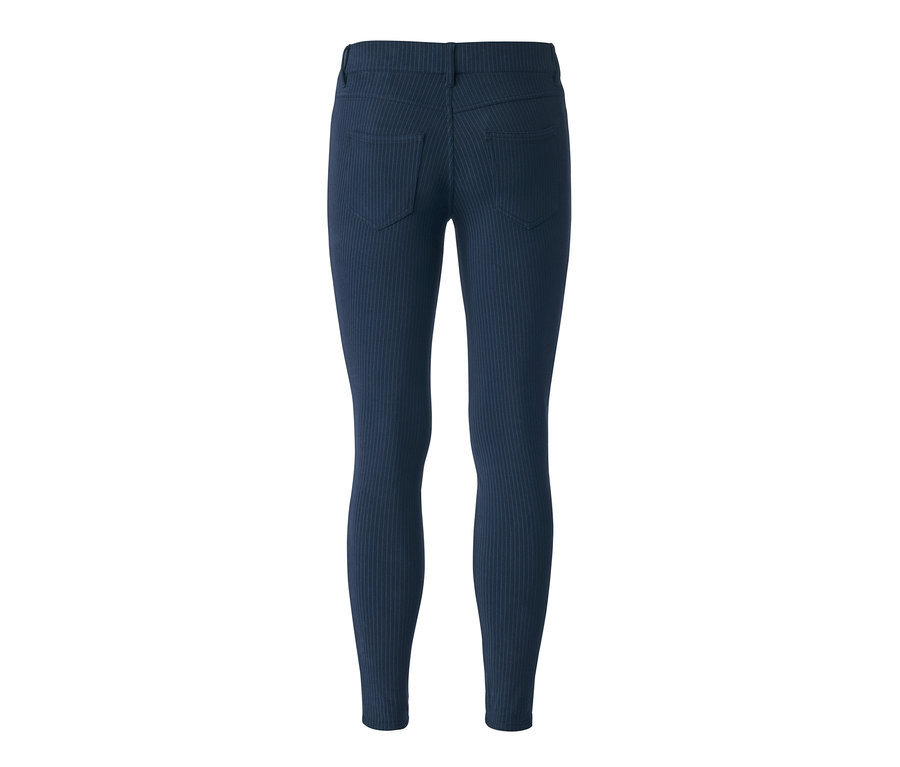 Női, csíkos jeggings hátulnézetből.