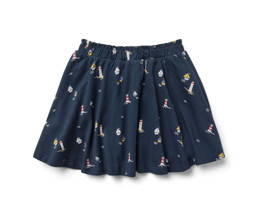Sötétkék kislány jersey szoknya világítótornyokkal és vitorlásokkal.