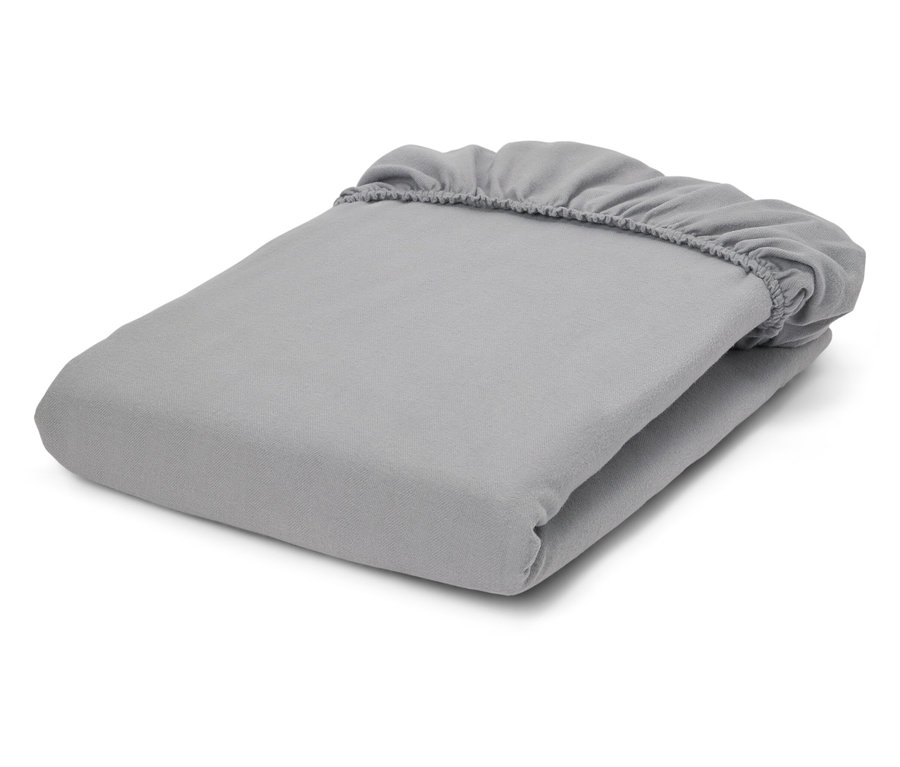 Összehajtott szürke gumis lepedő.