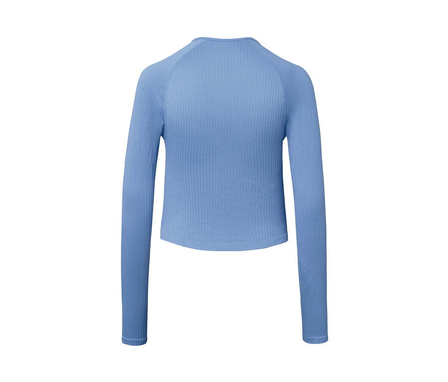 Világoskék, rövidített női sportfelső hosszú ujjal.