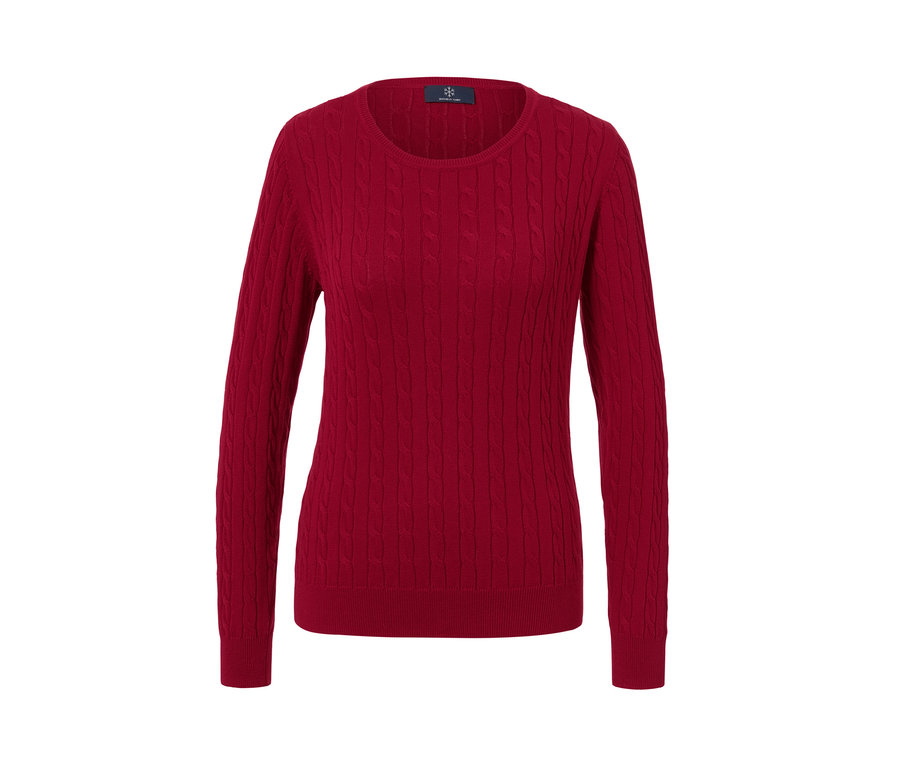 Piros kötött női pulóver.