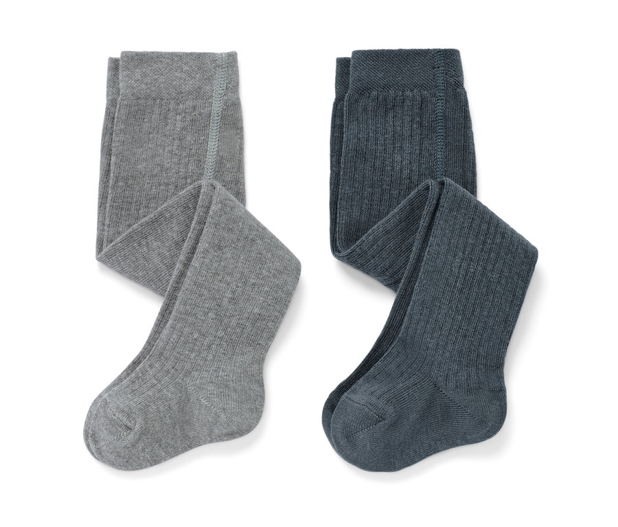 Két kisgyerek harisnyanadrág.