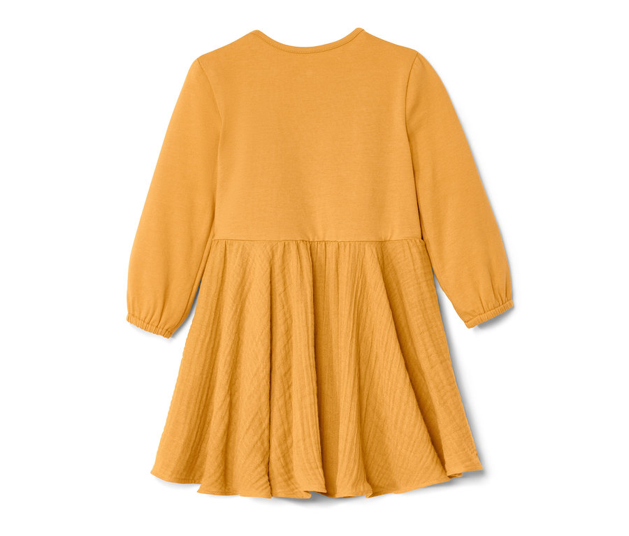 Sárga, hosszú ujjú baba szövött ruha.