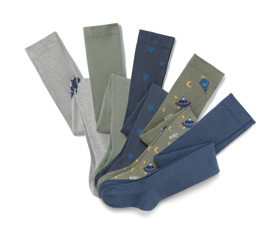 Öt darab pamut harisnyanadrág, világűr mintával, kiterítve.