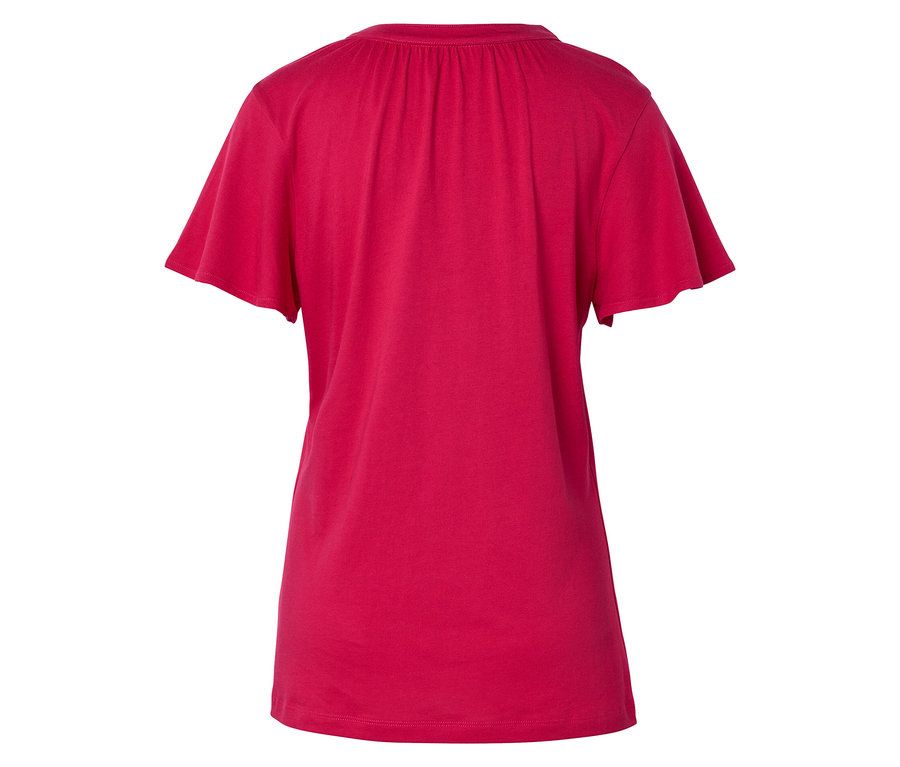 Hátulnézet egy rövid ujjú, rózsaszín pólóról.