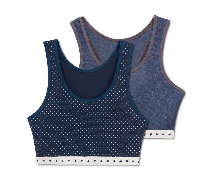 Két lány bustier melltartó, egy sötétkék fehér pöttyökkel, a másik kék.