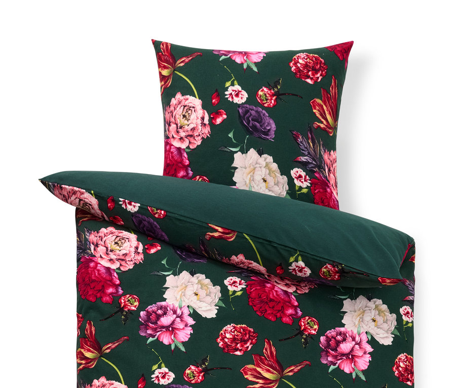 Zöld pamutflanel ágynemű virágmintával.