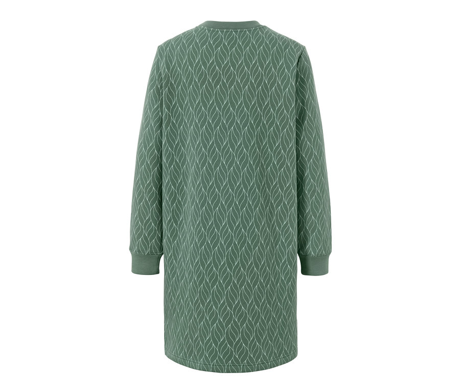 Hátulnézet egy hosszú ujjú, leveles mintás női lezser ruháról.