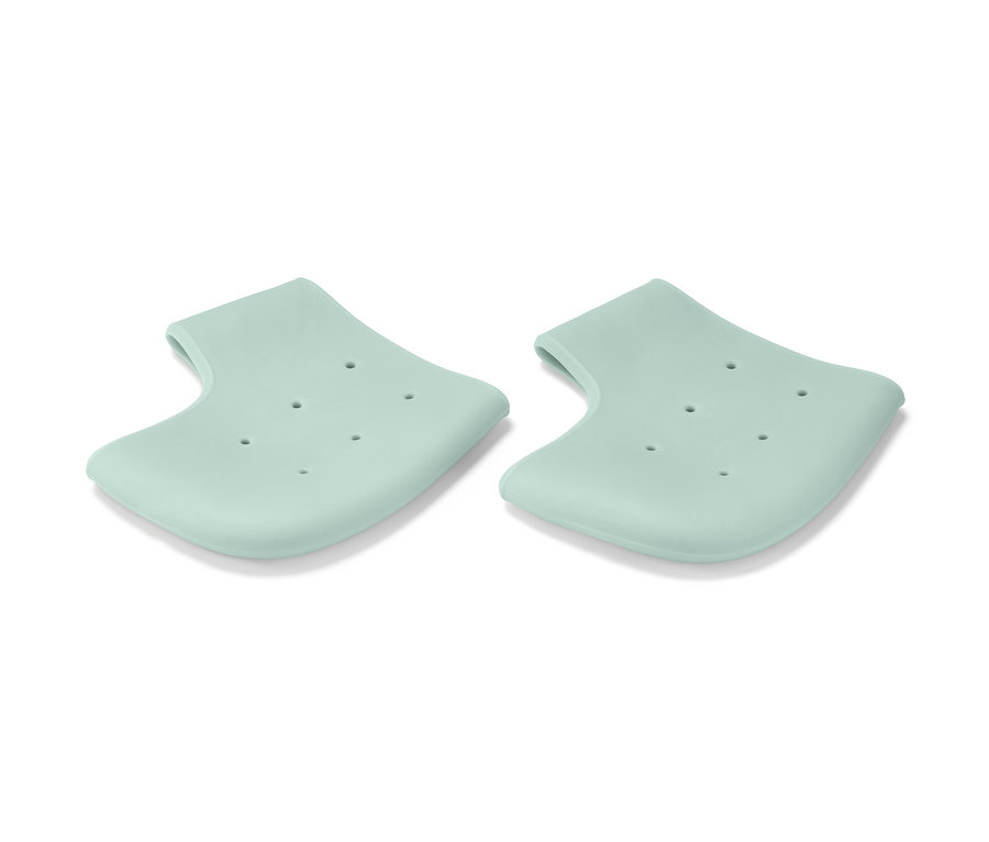 Két világoszöld sarokvédő.