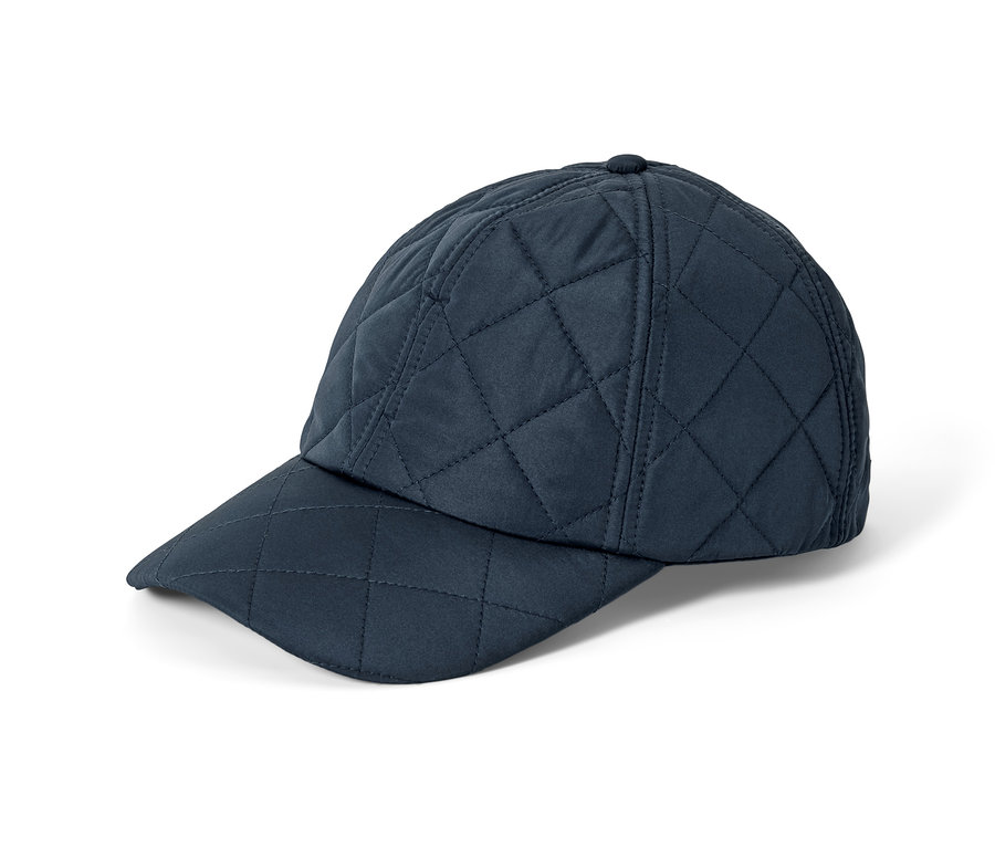 Sötétkék, steppelt női sapka.