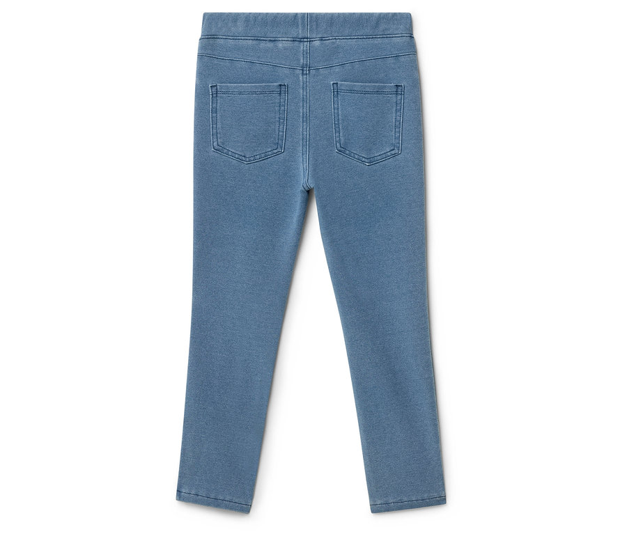 Világoskék leggings két hátsó zsebbel fekszik egy fehér háttéren.