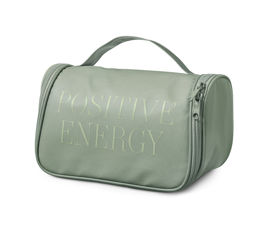 Feliratos, zöld neszesszer Positive Energy felirattal.