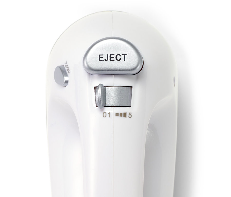 Egy fehér kézi robotgép felső részletének közeli képe.