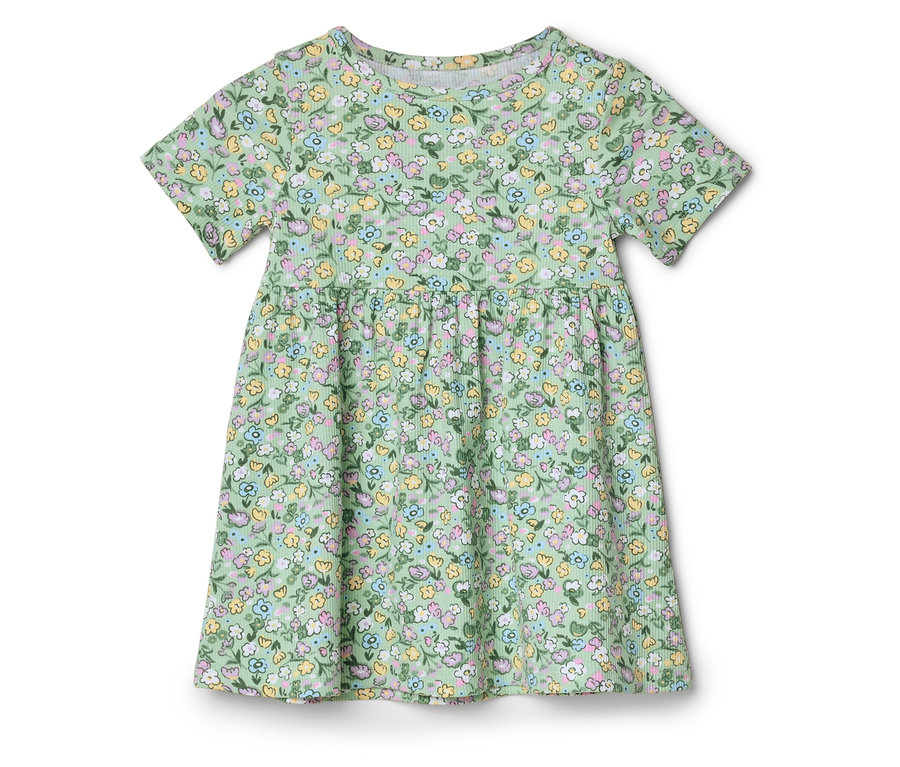 Egy zöld, rövid ujjú ruha sárga, kék és rózsaszín virágmintával.