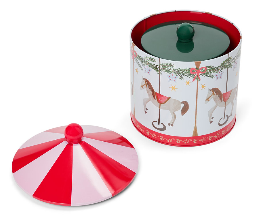 Nyitott kekszes doboz karusszel ló motívummal és piros-fehér csíkos fedővel.