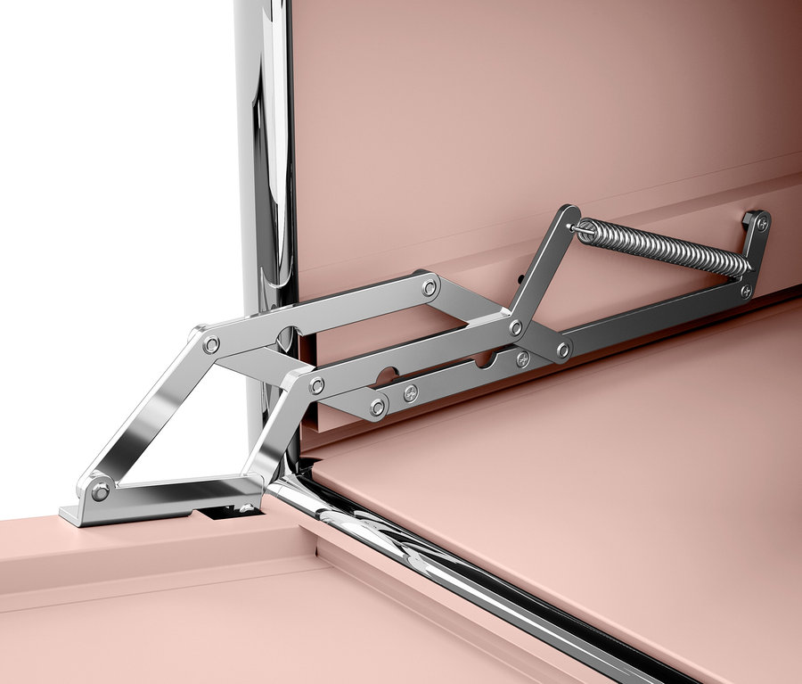 Egy rózsaszín szekrény nyitószerkezetének részlete.