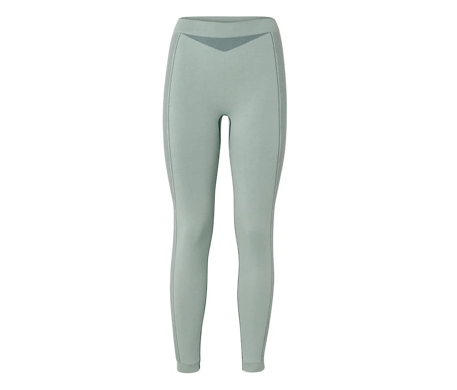 Világoszöld varrás nélküli leggings sötétebb mintás részletekkel a derékpánton és a külső combokon.