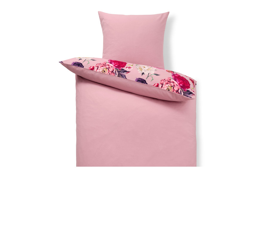 Rózsaszín pamutflanel ágynemű, normál méret, virágmintával a párnán.