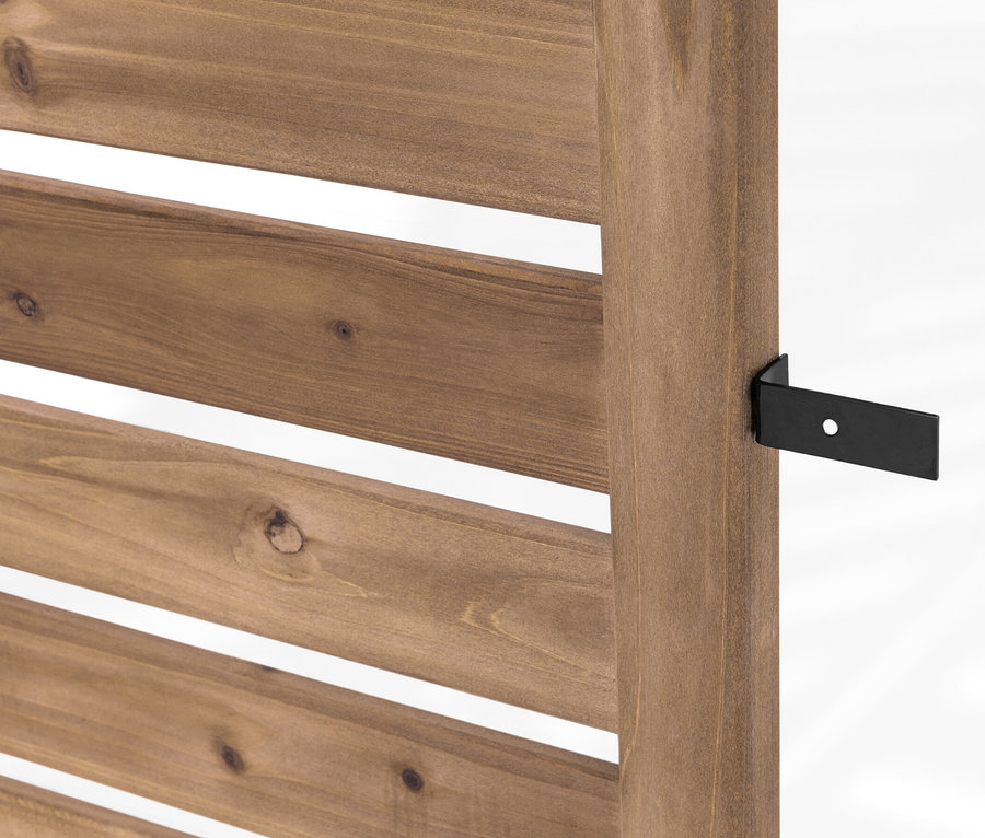 A »Tinus« flexibilis paraván növényládákkal és fekete fém tartóval részlete.