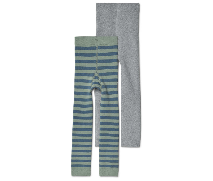 Két leggings van egymás mellett, az egyik szürke, a másik zöld-kék csíkos.