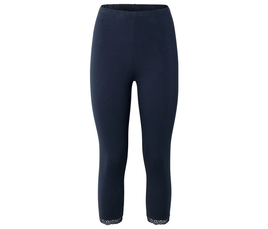 Sötétkék, térdig érő leggings csipkés szegéllyel.