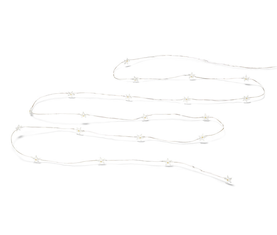 Mikroledes fényfüzér, csillagok fehér háttérrel.