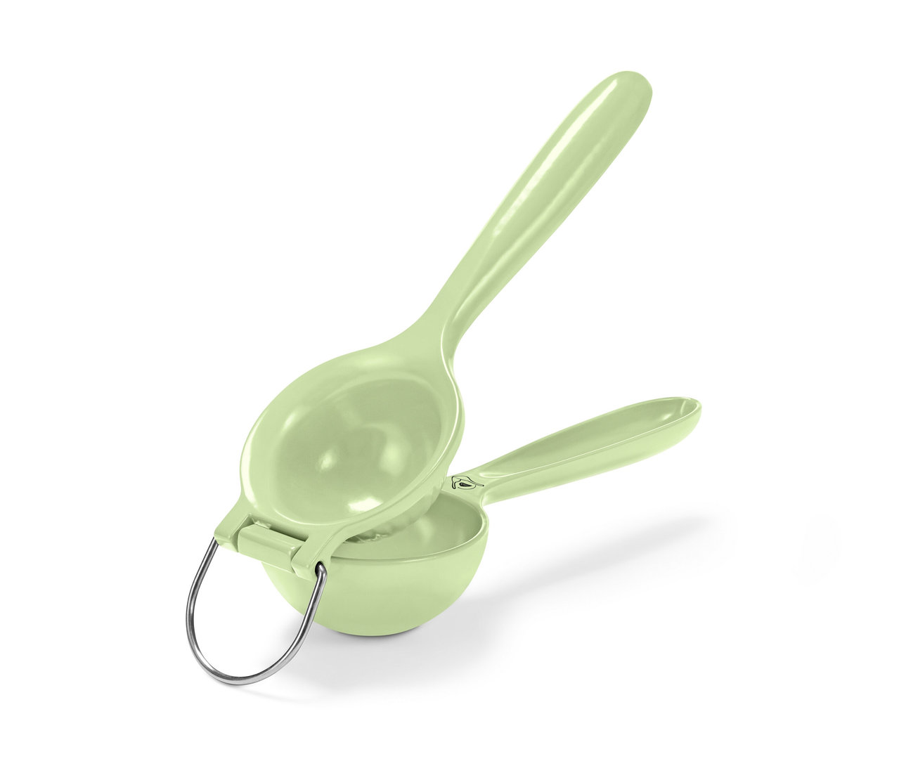 Egy világoszöld citrusprés.